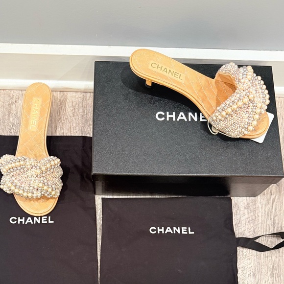 CHANEL Shoes - CHANEL Pearl and Beige Slip-On Kitten Heel Sandals EUC